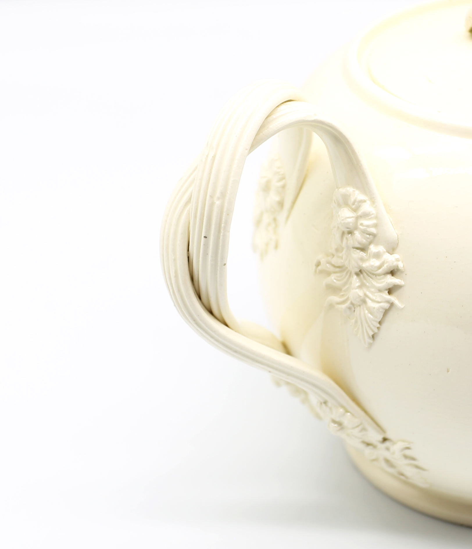 A Leeds creamware globular teapot and cover, with a twisted strap handle and floret terminals, the - Image 6 of 17