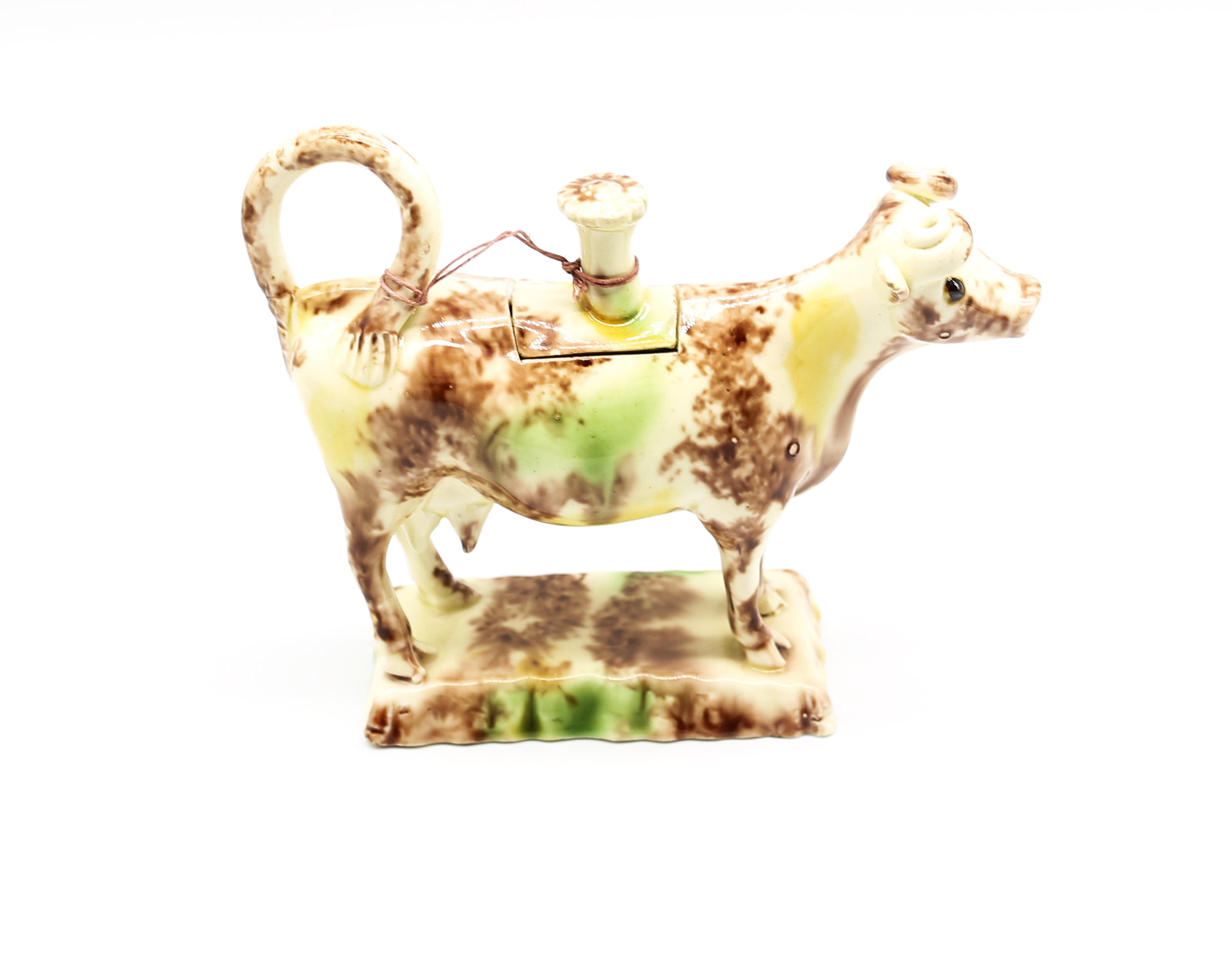 A Staffordshire Whieldon creamware cow creamer standing on an oblong base, sponge decorated in - Image 3 of 8