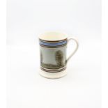 A creamware Mocha Quart size, pale blue ground with a mid blue band and narrow brown bands to top
