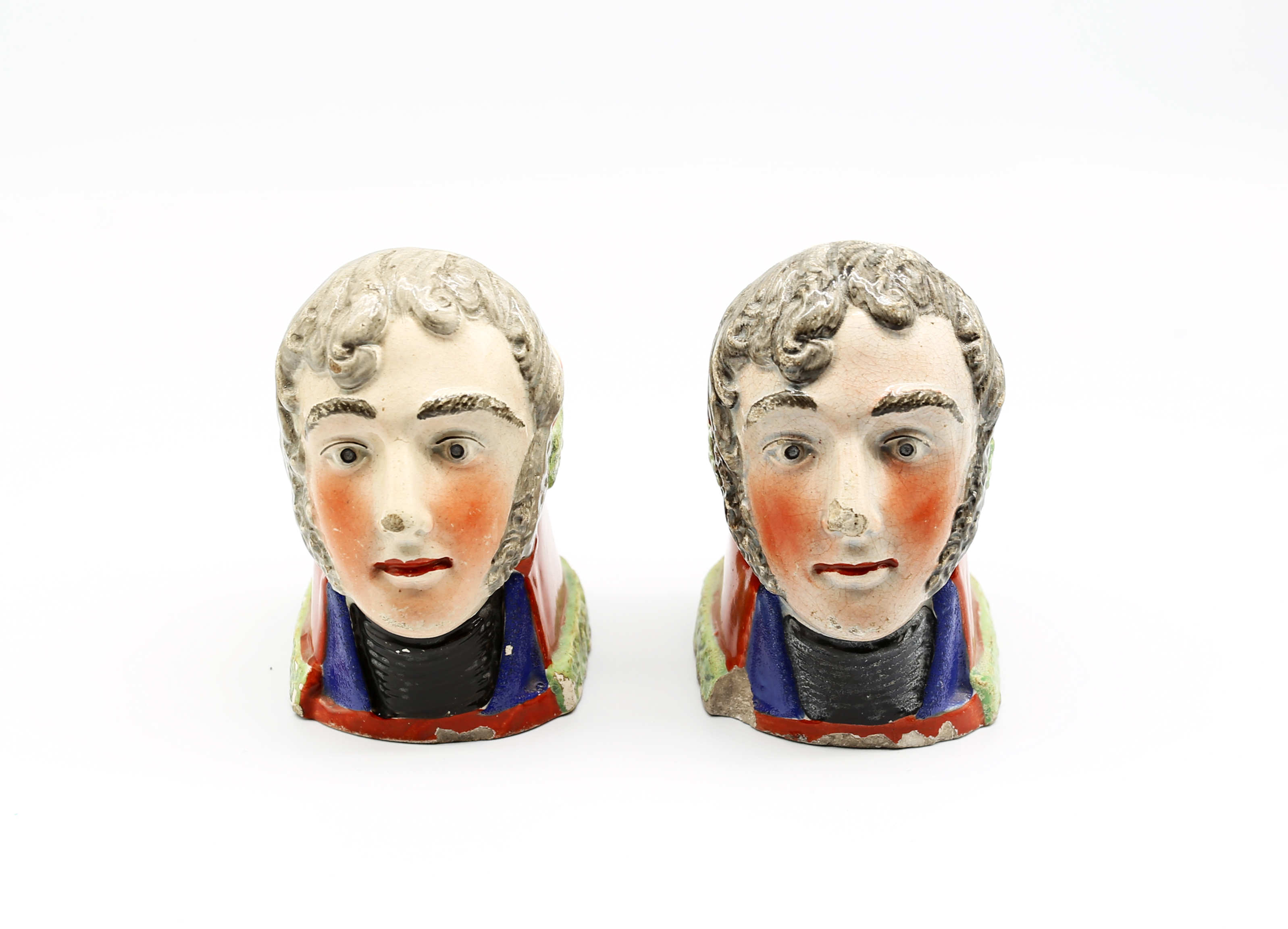 Two Staffordshire pottery furniture rests with the face of The Duke of Wellington  Circa 1820.