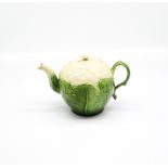 A Wedgwood 18th century creamware ‘Cauliflower’ teapot and cover. Moulded as a cauliflower decorated