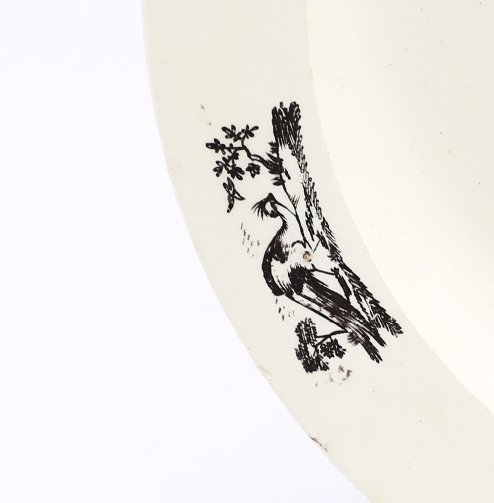 A late 18th century creamware plate, Liverpool, with a print of a war ship and birds printed in - Image 4 of 7
