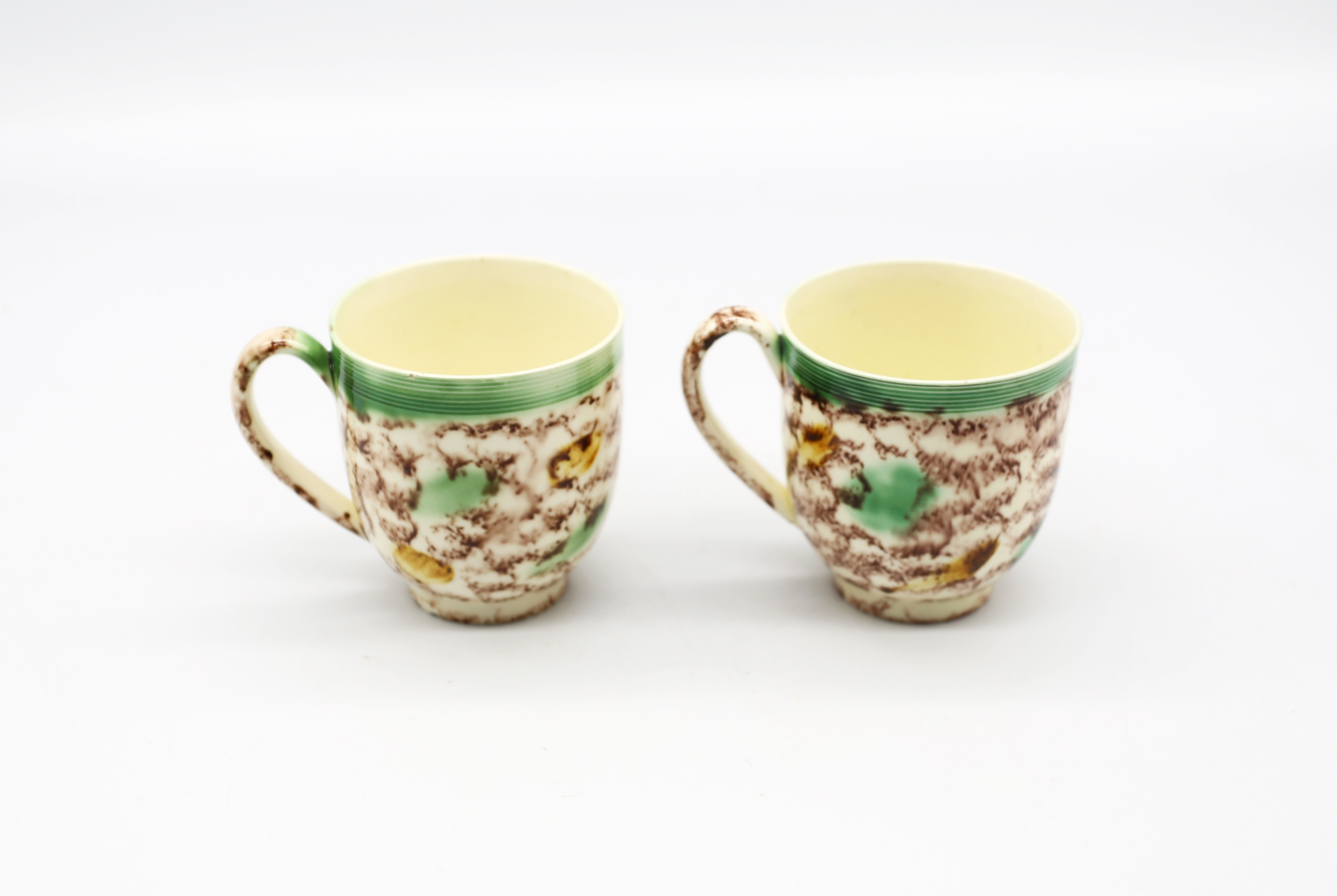 Two Whieldon style creamware coffee cups decorated in copper manganese and yellow.  Circa 1770. - Image 3 of 14