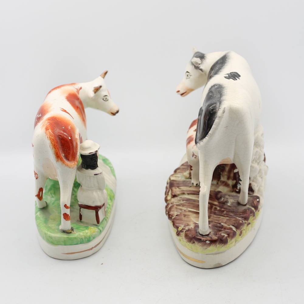 A Victorian Staffordshire pottery Cow and suckling calf standing on a grassy mound by a brook, along - Image 4 of 5