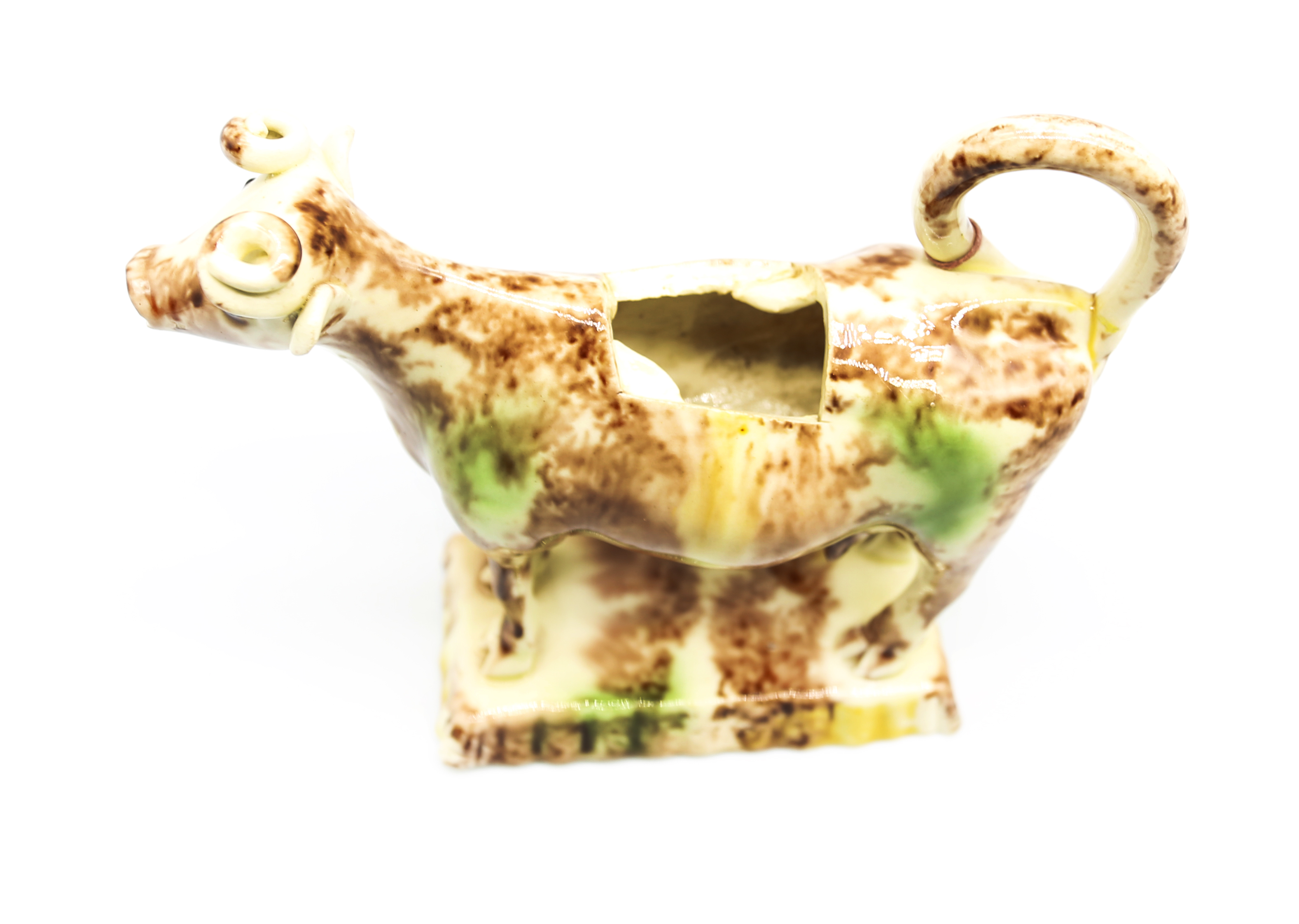 A Staffordshire Whieldon creamware cow creamer standing on an oblong base, sponge decorated in - Image 5 of 8