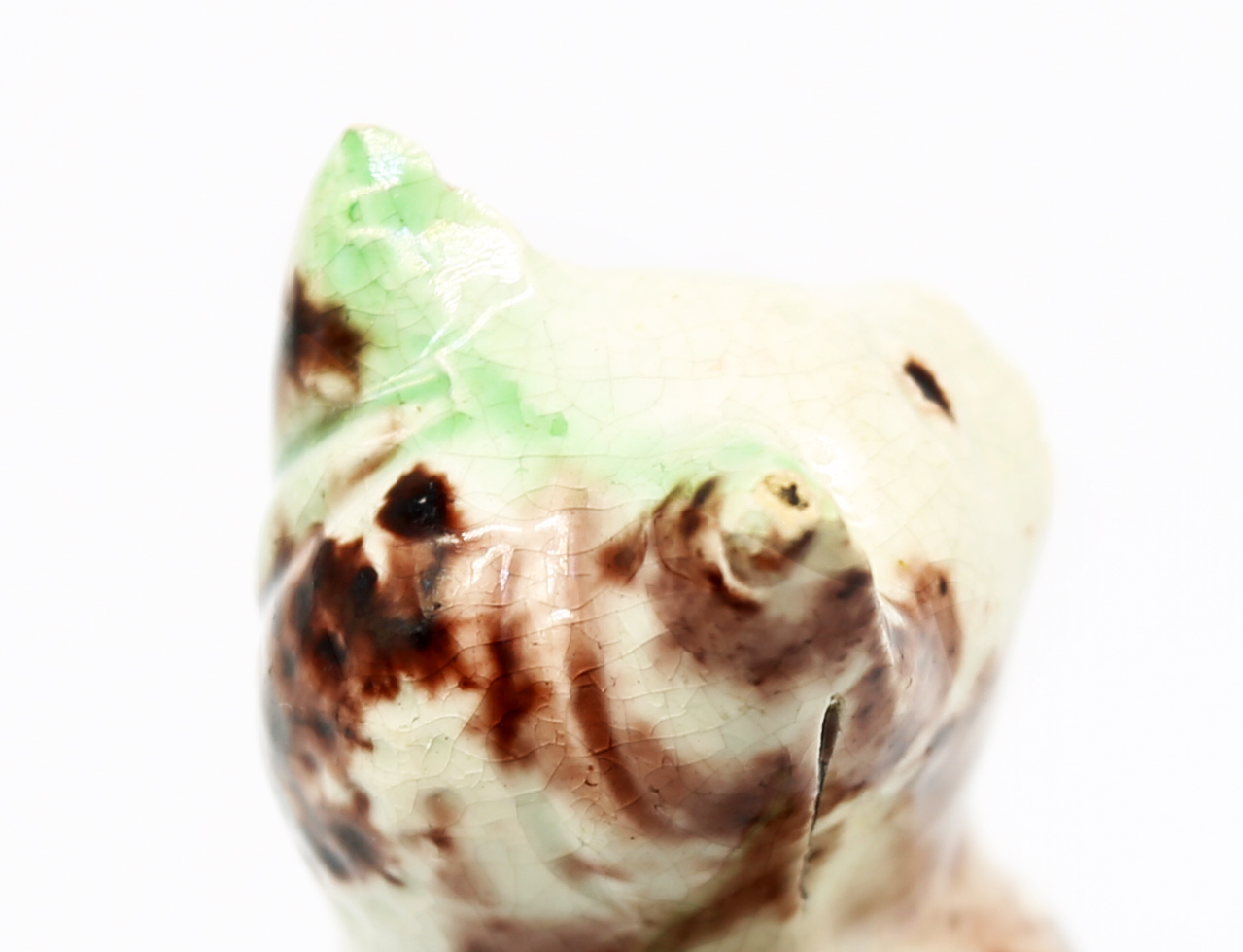 A small Staffordshire Whieldon creamware seated cat, sponge decorated in shades of green and brown - Image 6 of 7