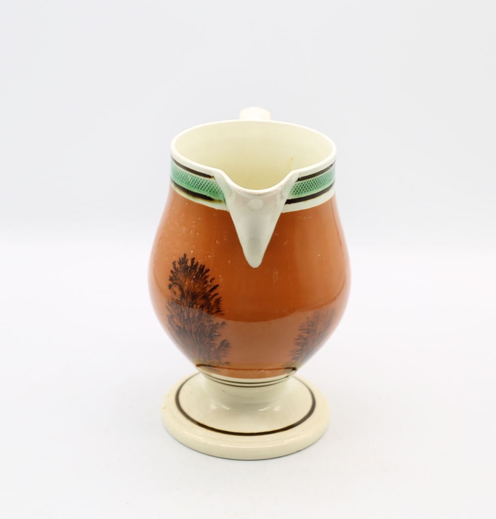 A creamware Mocha footed jug, dark terracotta with black feathered trees and green and brown - Image 4 of 9