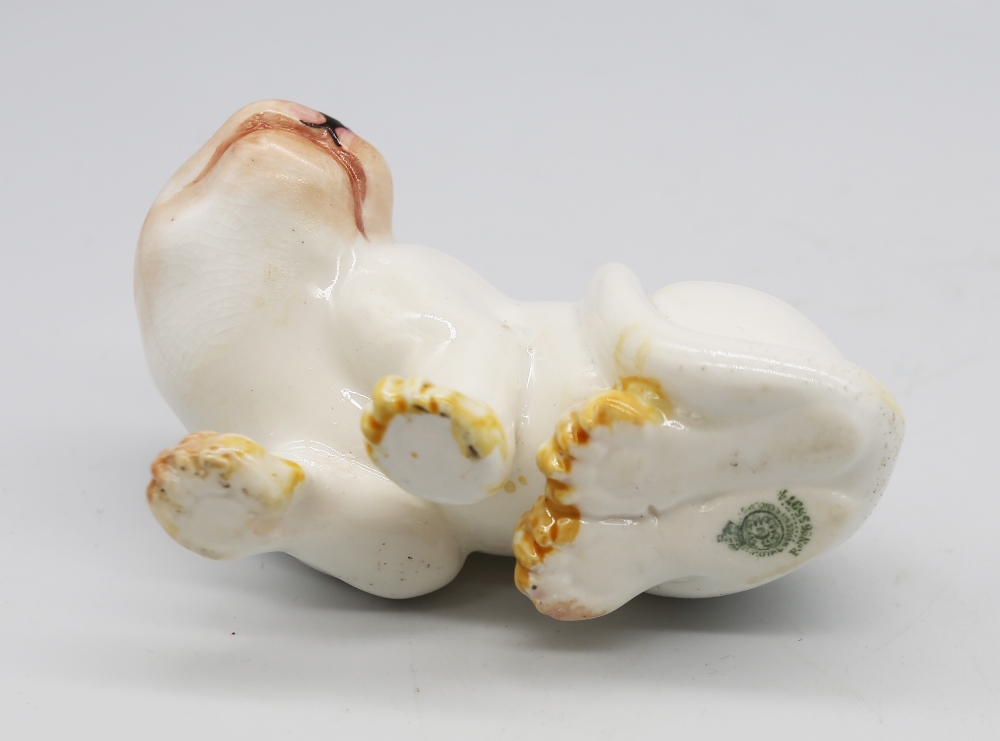 A Royal Worcester netsuke modelled as a Cheetah, early 20th century, painted details to white - Image 3 of 3