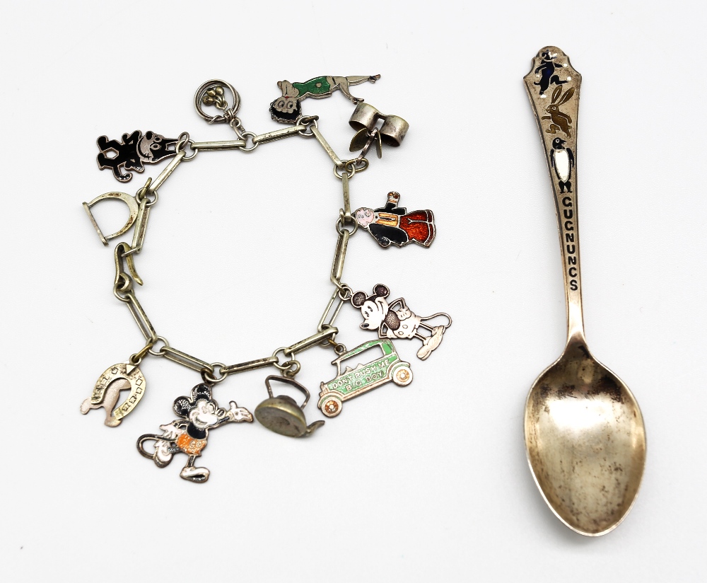 A novelty George V silver teaspoon with enamelled comical animals and "Gugnuncs" lettering,