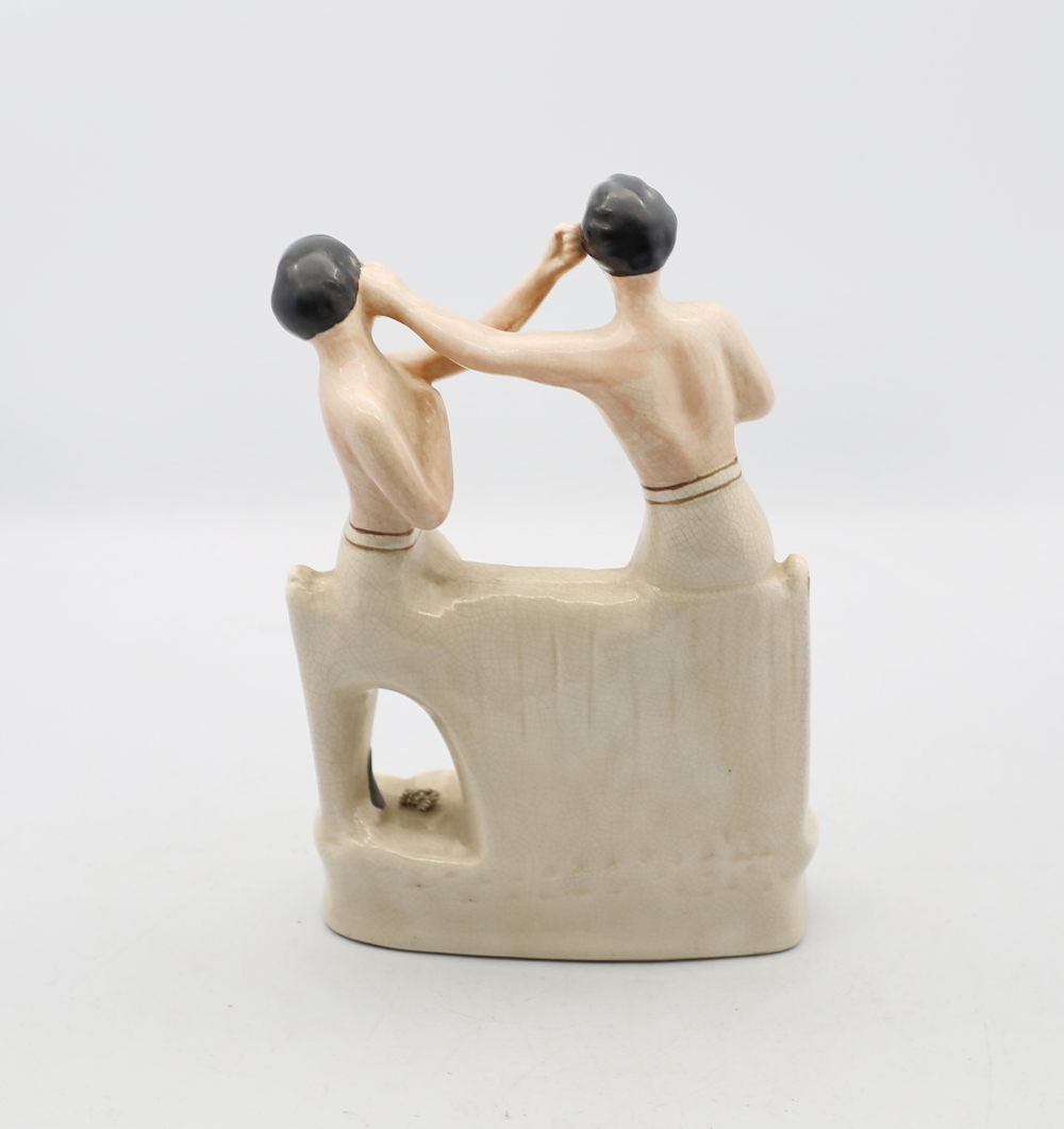 A reproduction Staffordshire white and gilt figure of Heenan and Sayers standing on an oval base. - Image 3 of 6