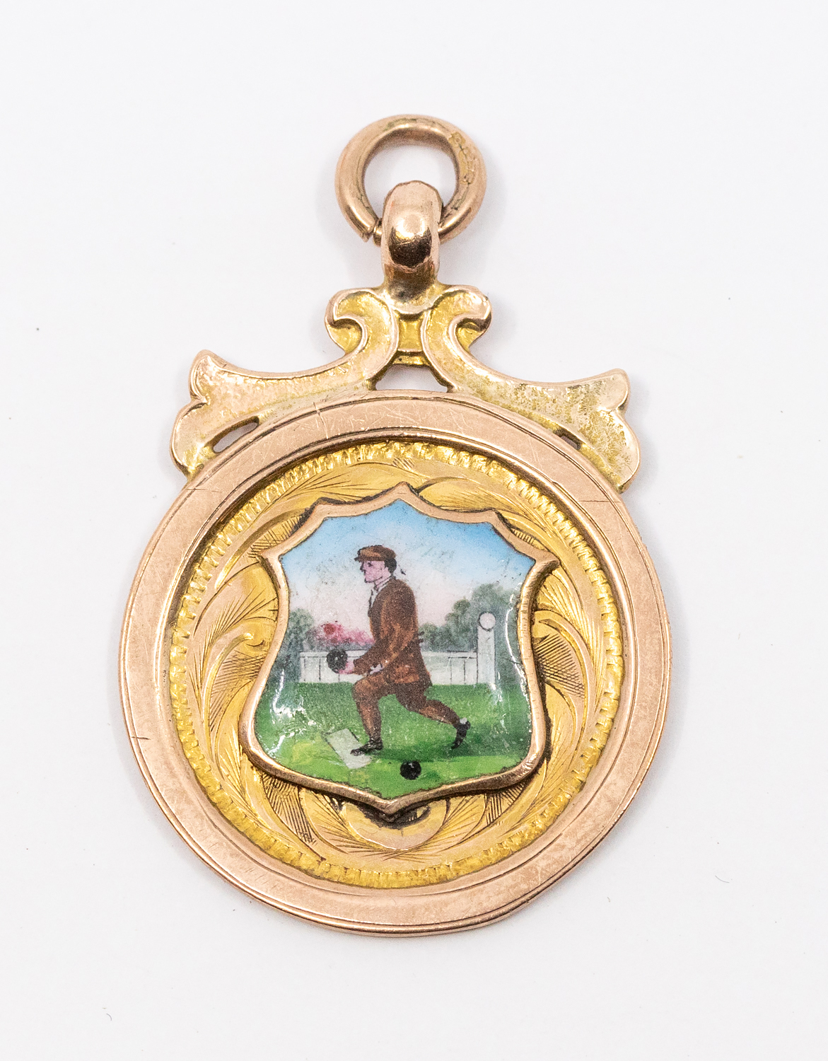 A 9ct gold and enamelled bowls medal, engraved to the reverse, 'Gartloch Bowling Club Championship