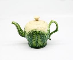 A Wedgwood 18th century creamware ‘Cauliflower’ teapot and cover. Moulded as a cauliflower decorated