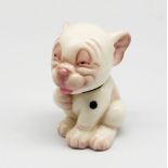 A Royal Worcester porcelain Bonzo Dog figure, depicted in seated posture, with pink stamp, no 2855