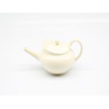 A miniature Wedgwood creamware teapot and cover, with a flared lip. Impressed WEDGWOOD  Circa