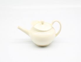 A miniature Wedgwood creamware teapot and cover, with a flared lip. Impressed WEDGWOOD  Circa