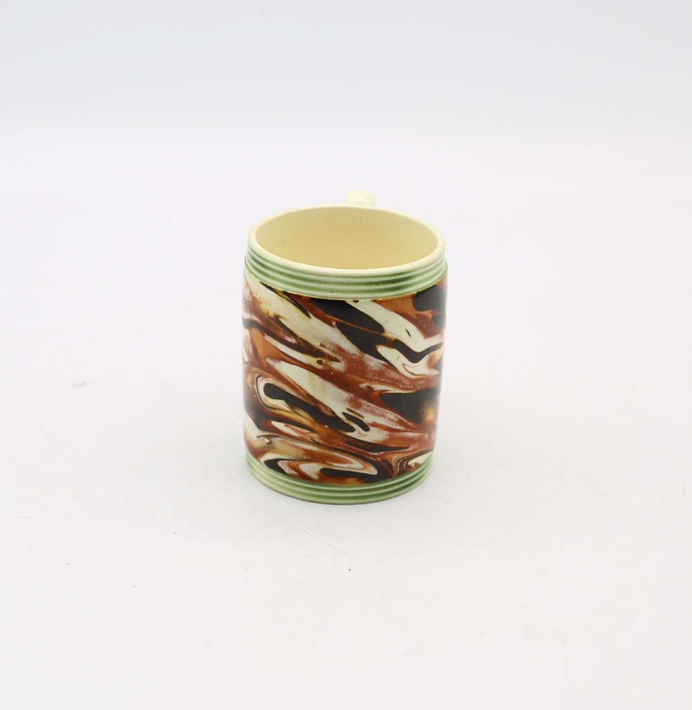 A small creamware cylindrical mug with coloured marbled decoration, with green ribbed bands to top - Image 3 of 7