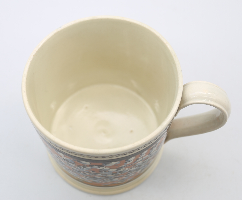 A large creamware mug, orange ground with a spattered finger trail design with  black  borders to - Image 5 of 8