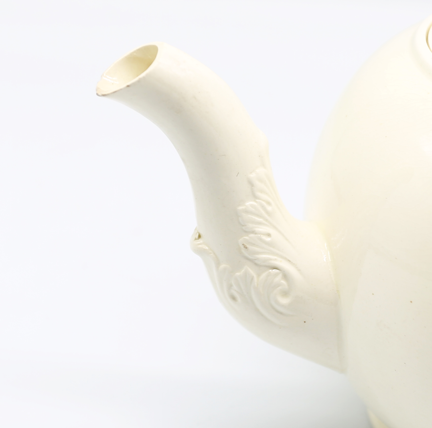 A Leeds creamware globular teapot and cover, with a twisted strap handle and floret terminals, the - Image 8 of 17