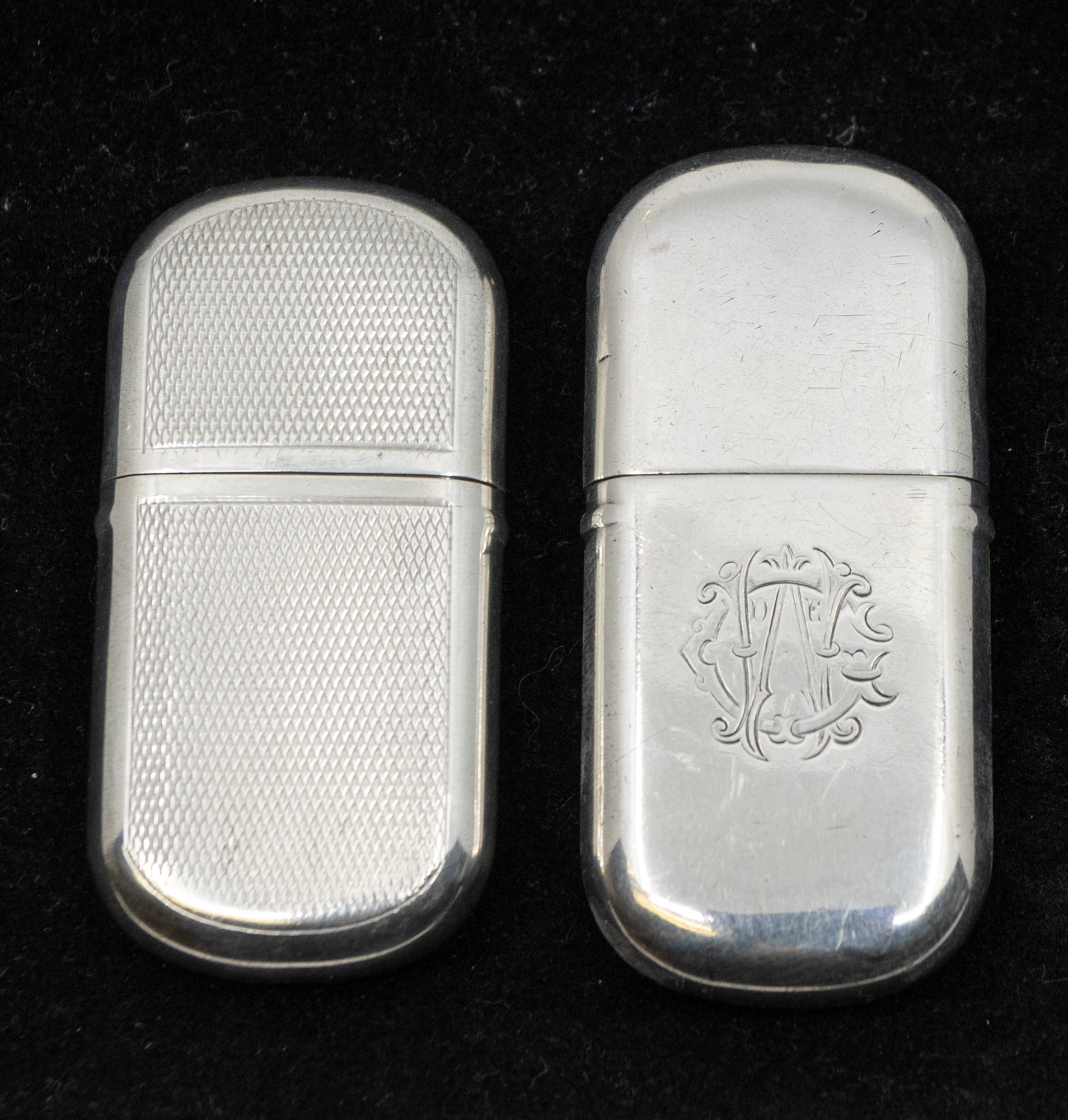 A George V engine turned silver lighter, of oval shape with removable cover, hallmarked by E.S. - Image 2 of 3