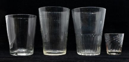 A collection of ale glasses, fluted and plain along with a small twisted gin glass, all late 18th