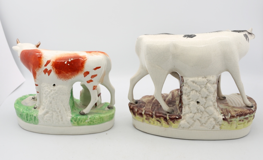 A Victorian Staffordshire pottery Cow and suckling calf standing on a grassy mound by a brook, along - Image 3 of 5