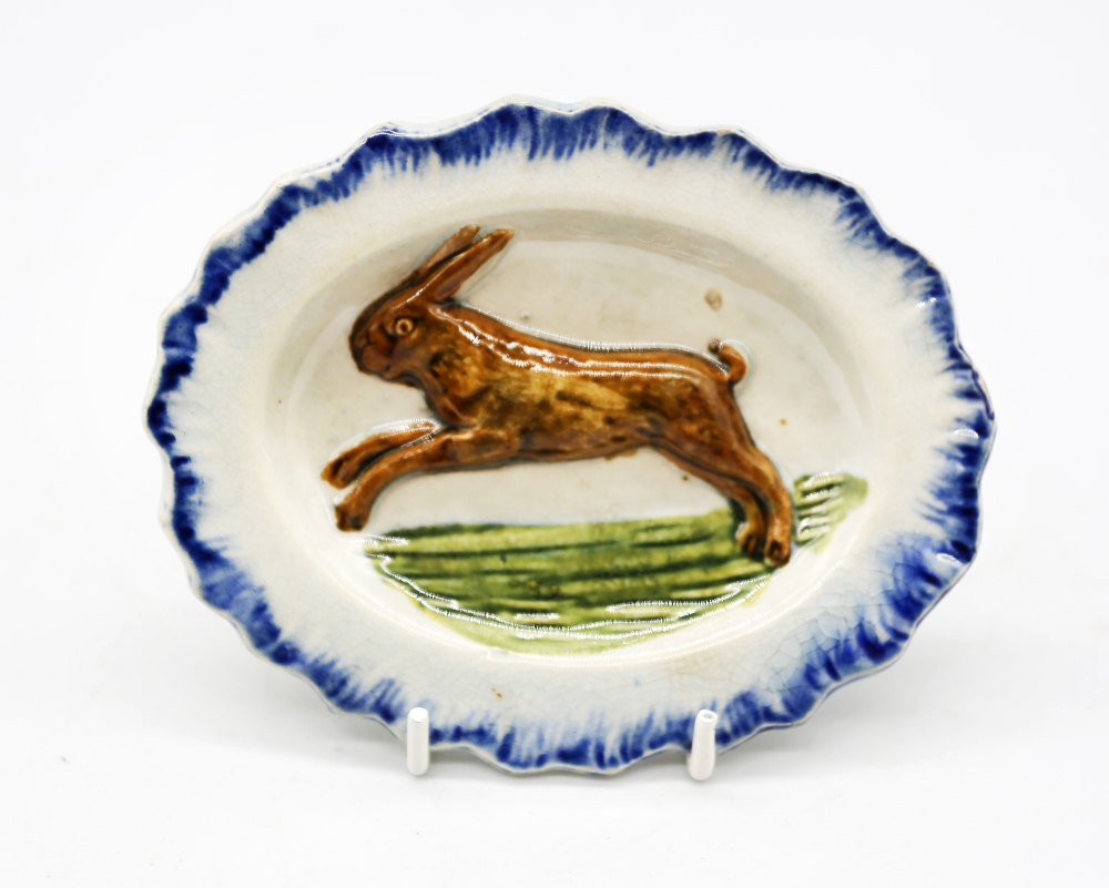 A pearlware ‘Toy’ oval platter with a rabbit moulded in the centre with a blue feather moulded - Image 2 of 8