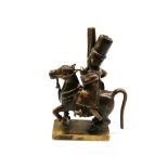 A 19th century Vizagapatam bronze figure of a Carabineer on horse, with flintlock carbine in hand,