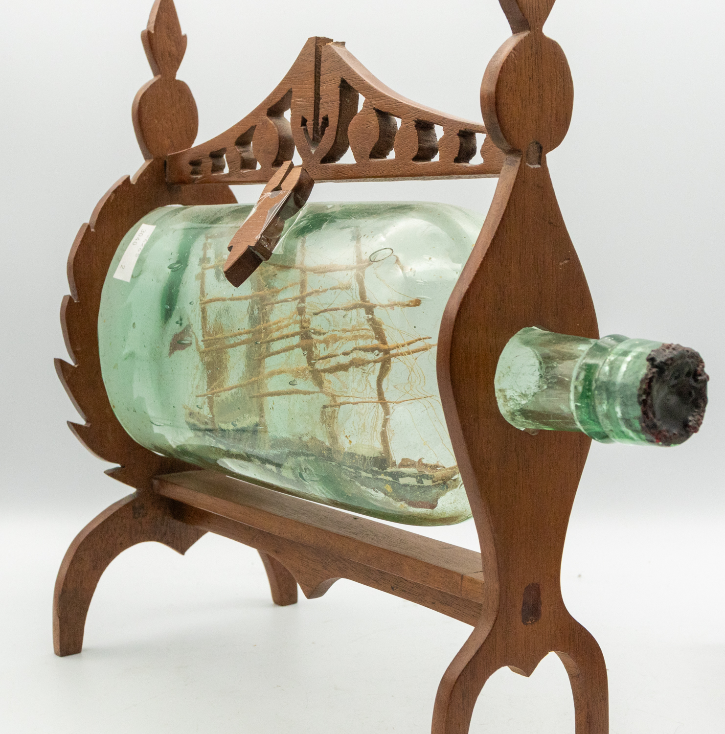 Two 19th century wooden models of Ship's in glass bottles; one encased in a light wooden frame of - Image 4 of 4