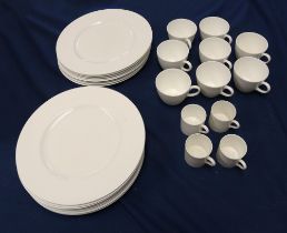 A 20th century Wedgwood plain white part tea service to include; tea pot, sugar bowl and cover, milk