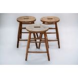 Set of three wooden stools