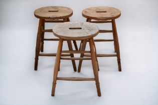 Set of three wooden stools