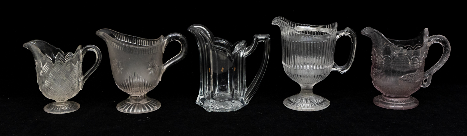 A collection of 19th Century moulded glass cream jugs. - Image 2 of 3