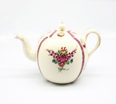 A Staffordshire Wedgwood creamware teapot and cover, painted with puce chintz bands with sprays of