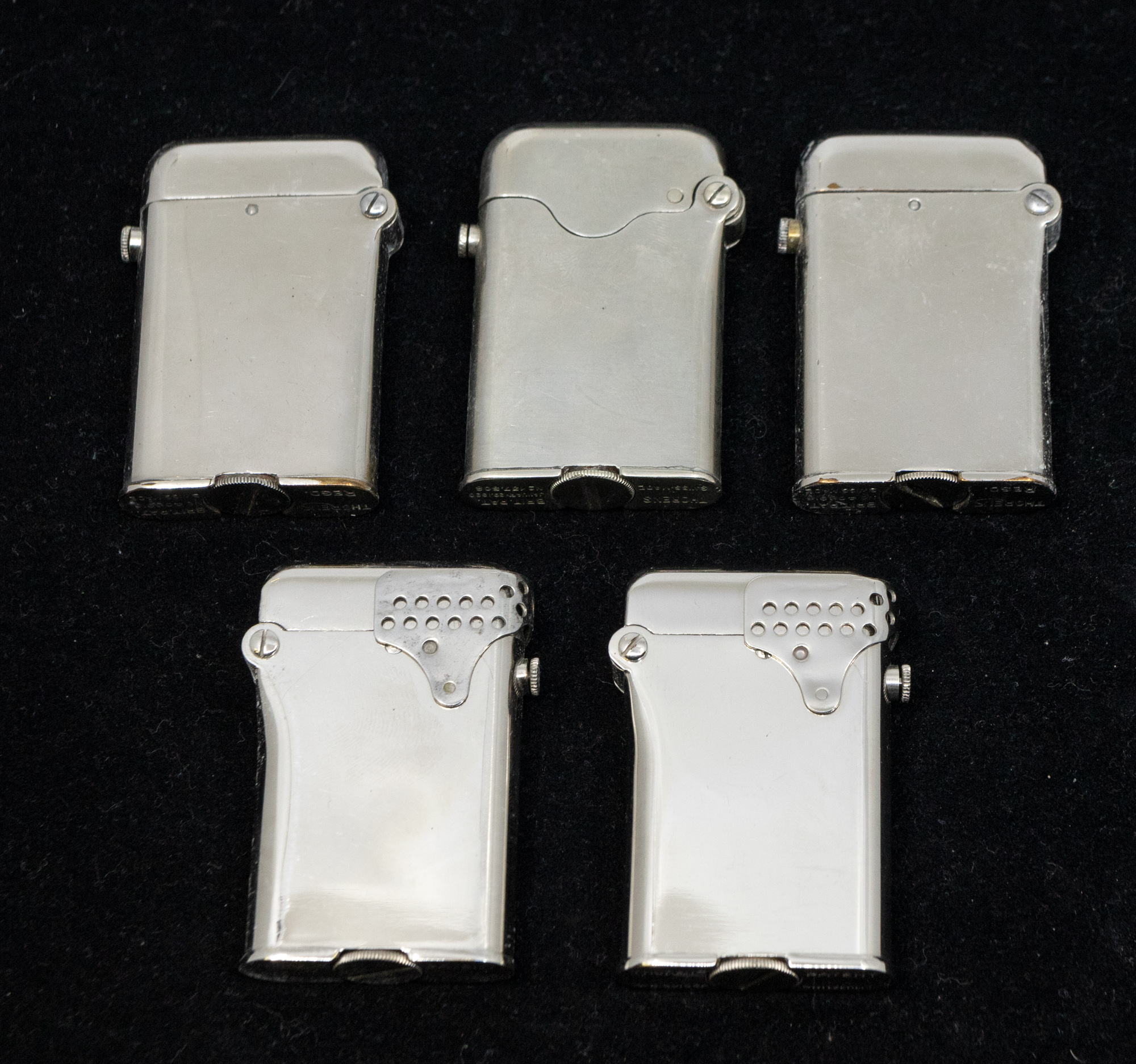 A collection of five Thorens plated or steel cased lighters, all of same rectangular shape with - Image 2 of 4
