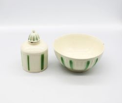 A Leeds creamware tea caddy and cover along with a Leeds creamware bowl. Both with ribbed bodies and