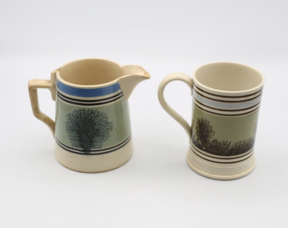 A pint sized Mocha ware mug, green ground with black feathered trees and pale blue and black - Image 3 of 7