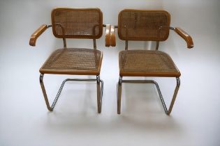 A pair of Marcel Breuer cantilever chairs in chrome and rattan, marked 'Made in Italy'