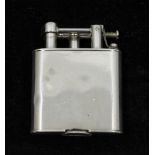 A George V silver lighter, of oval shape with plain design, hallmarked by  Wagner & Gerstley Ltd,