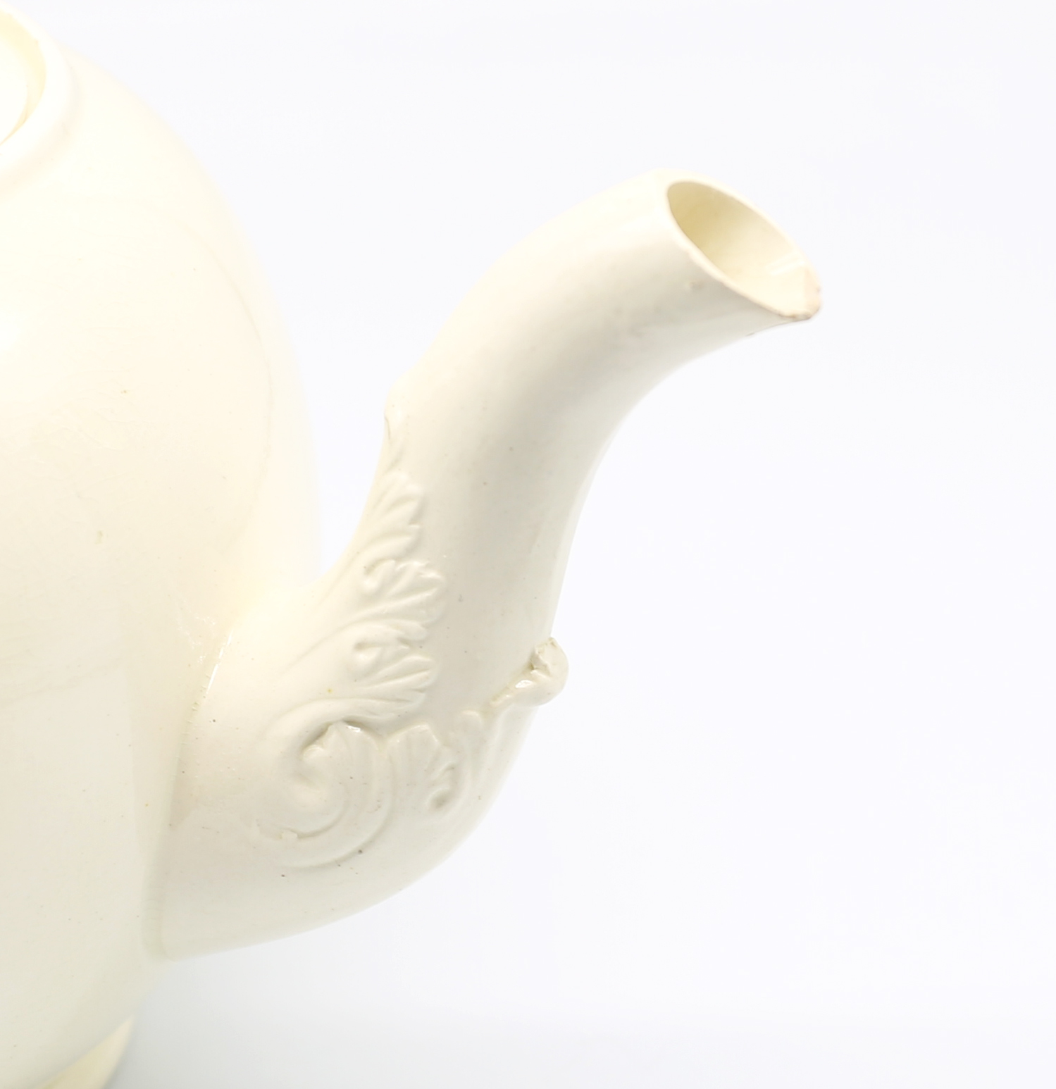 A Leeds creamware globular teapot and cover, with a twisted strap handle and floret terminals, the - Image 9 of 17