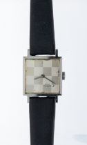 Girard- Perregaux - a ladies steel cased wristwatch, comprising a signed square silvered