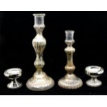 Two mid 19th Century glass candle sticks with silvered interiors, hand blown along with two later