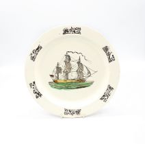 A late 18th century creamware plate, Liverpool, with a print of a war ship and birds printed in