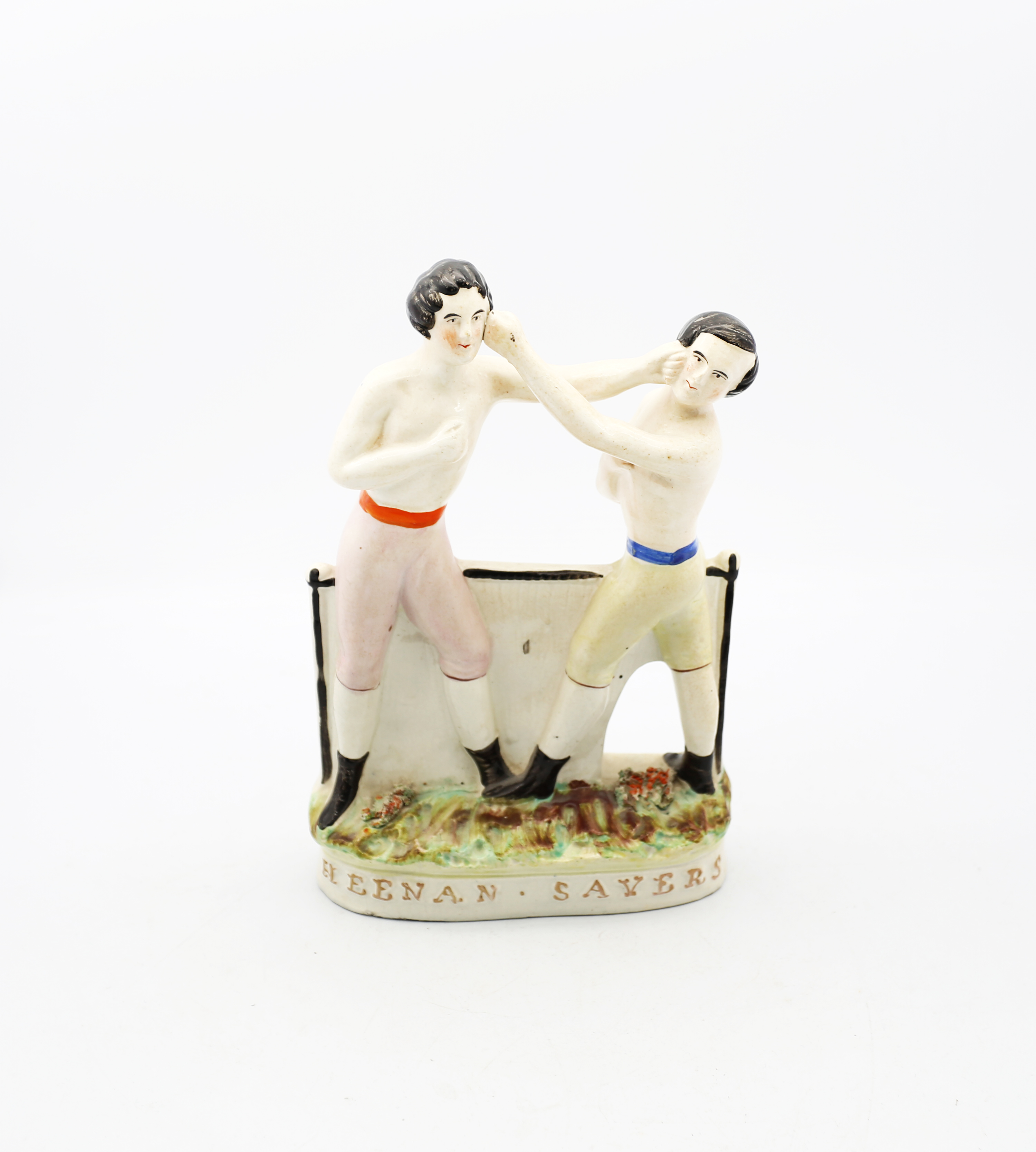 A Victorian Staffordshire pottery figure of Heenan and Sayers, standing on an oval base  titled  ‘