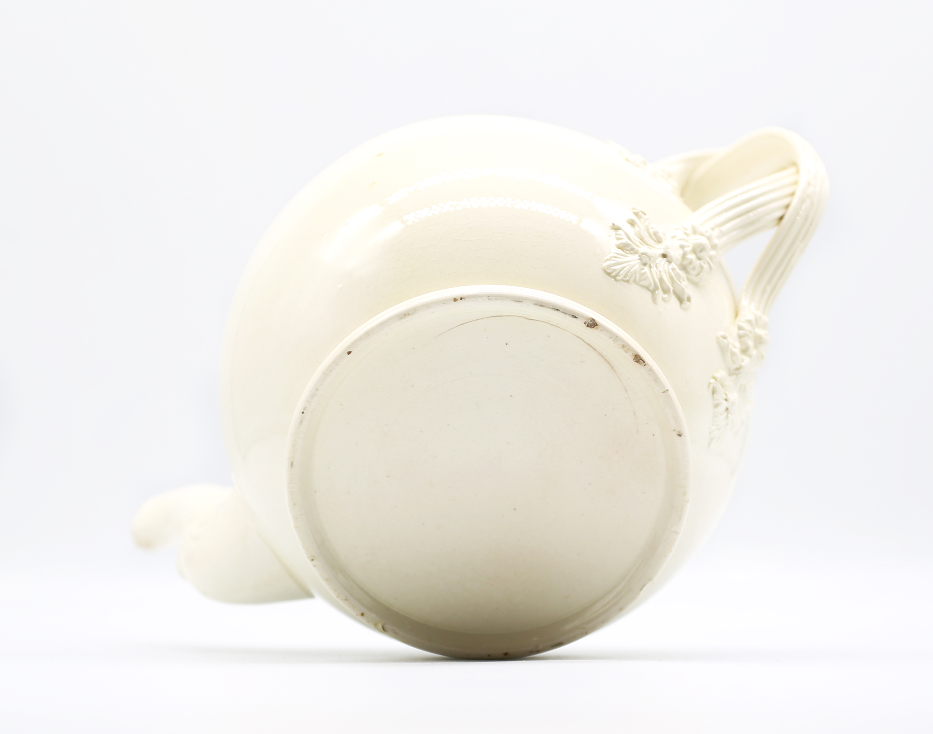 A Leeds creamware globular teapot and cover, with a twisted strap handle and floret terminals, the - Image 17 of 17