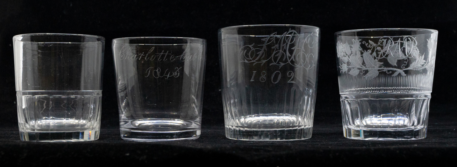 A collection of early ro mid 19th Century glass tumblers with etched detail to bowls.