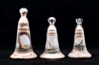 Three early 20th Century Isle of Wight curiosity sand sculptures in bottles, labels to base.
