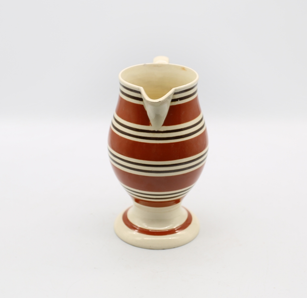 A creamware pedestal jug, with wide dark orange bands and narrow black bands  Circa 1800-1820. Size. - Image 2 of 9