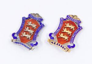 A George V silver gilt crest shaped badge, red and blue enamel with three Lions to centre, for the
