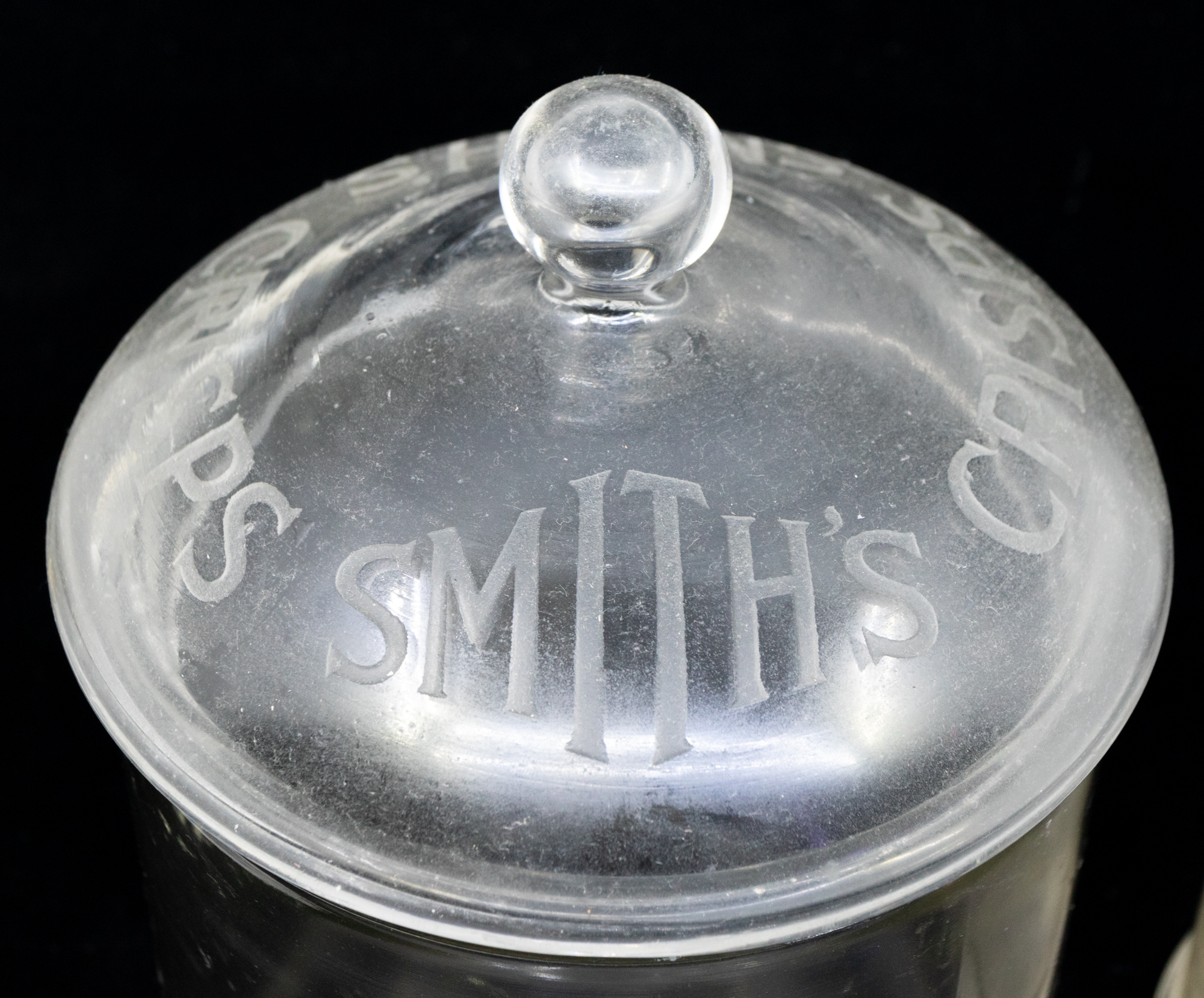 A collection of early 20th Century glass advertising jars, four in all, three with lids, Meredith - Image 4 of 5