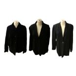 A black all wool Jean Muir studio jacket, 3/4 length, revers neckline, 2 flap pockets, slit sides, 3